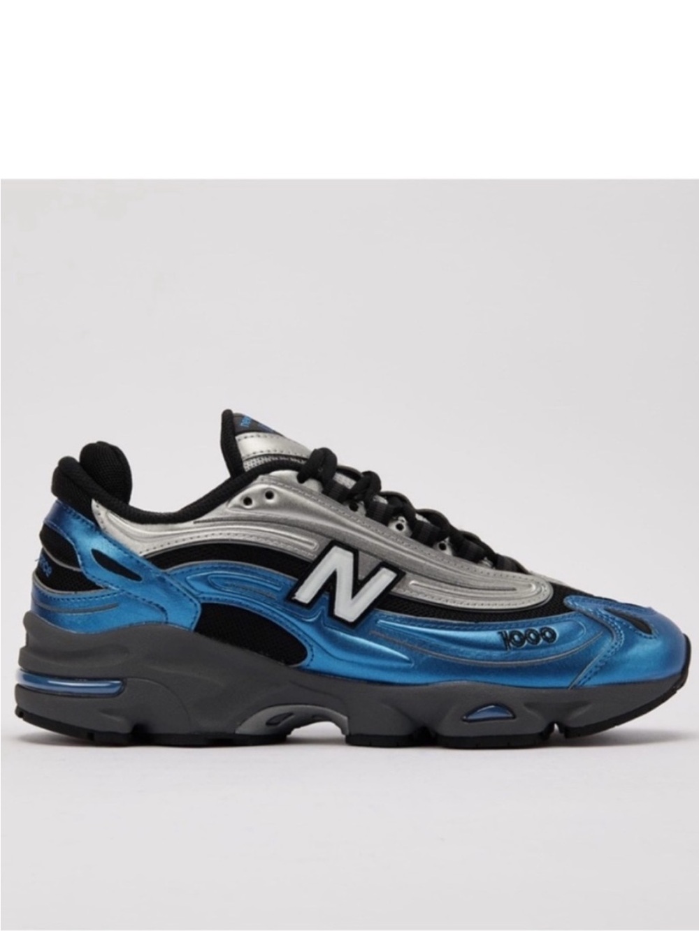 New Balance 1000 NB
Metallic Blue Casual Lifestyle Sneakers M1000ENV-D 8M;
9.5 W